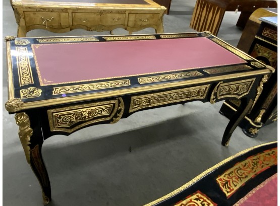 Black And Brass Inlaid Desk With Figural Accent Corners And Faux Tortoise Shell Detail And Leather Top