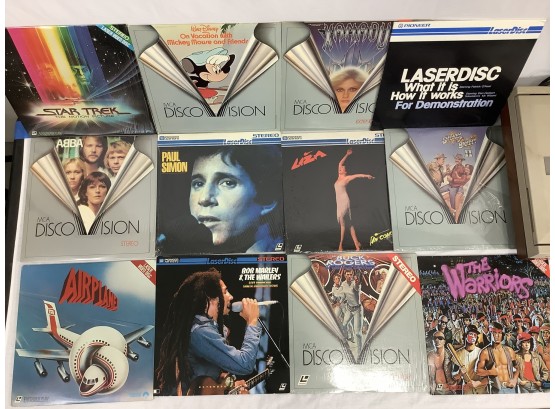 Pioneer Laser Disc Player With Assortment Of Laser Discs.