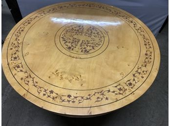 Burled 61” Round Table With Painted Decorations And A Pedestal Base
