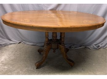 Inlaid Oval Center Table With A Carved Base