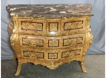 Marble Top Bombay Style Chest With Burled And Inlay Work Figural Pulls