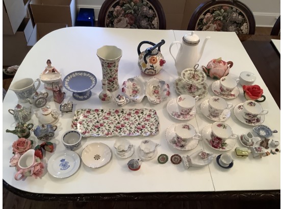 Assorted Fine China Including Teacups And Saucers, Teapots, And Miniatures