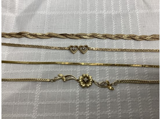 4 14kt Gold Bracelets Some With Diamonds 11.0 Grams