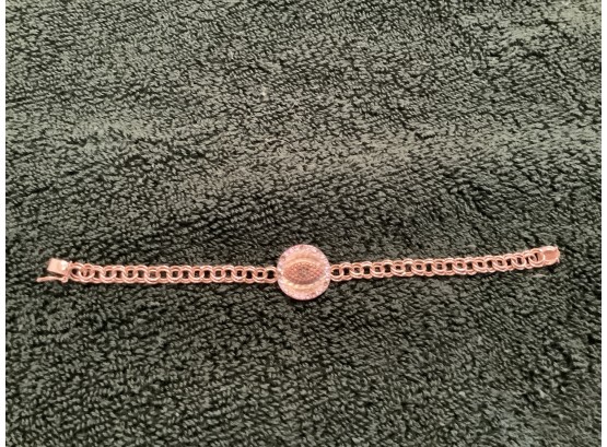 14ktGold Bracelet With A Costume Jewelry Center