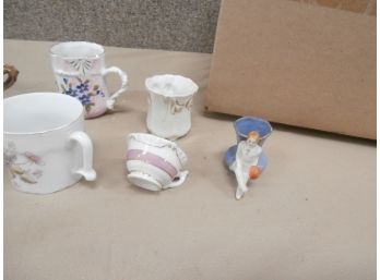 An Assortment Of Porcelain Including A Souvenir From Niagara Falls-Horseshoe Falls