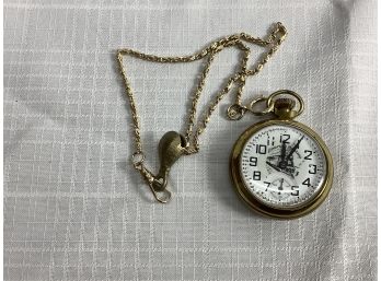 American Heritage Pocket Watch With An Engraved Train, Has A Watch Fob