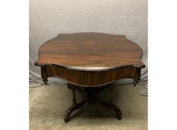 Rosewood Center Table With A 4 Legged Base