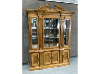 Maple Two Piece Carved And Burled Wood China Closet With Glass Shelves