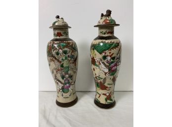 Pair Of Oriental Covered Urns With Fighting Scenes