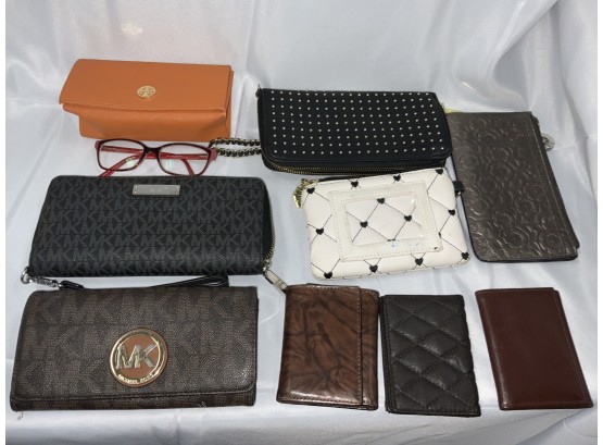 Grouping Of Handbags And Wallets And Glass Case With Glasses