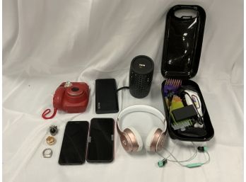 Assorted Lot Of Electronics Including Phones, Speaker, Camera, Headphones, 3 Costume Jewelry Rings