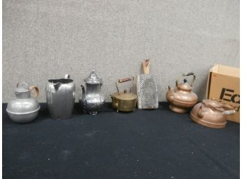 An Assorted Lot Including Pewter, Brass, Copper Teakettles, Pitchers And A Grater