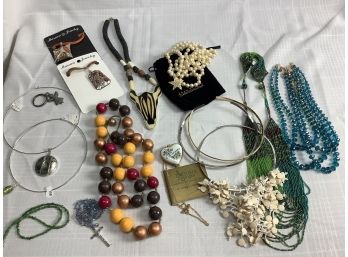 An Assorted Jewelry Lot Including A Joan Rivers Classic Collection Piece And A Limoges Heart Locket