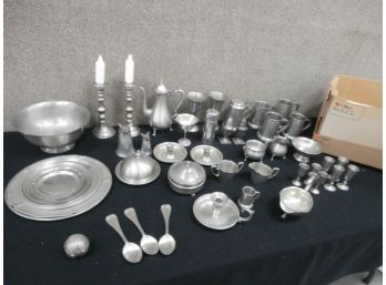 An Assorted Pewter Lot Including Candle Sticks, Plates, Spoons, Steins/mugs And Wolf Head Items