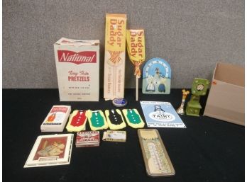 An Advertising Lot Including Sugar Daddy In Box