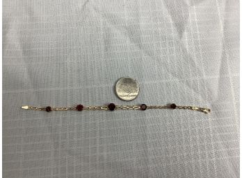 14K Garnet Bracelet 7 Inches Long 3.8 Grams