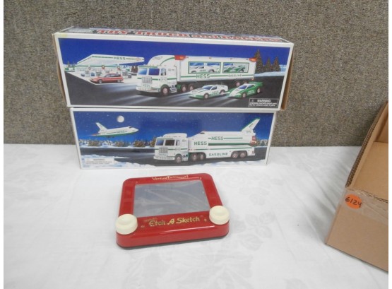 2 Hess Trucks With Boxes And A Travel Etch-A-Scetch