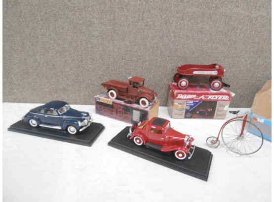 Vehicles Including A Replica 1941 Plymouth, 1932 Ford Coupe, Cast Iron Dump Truck And Radio Flyer Wagon