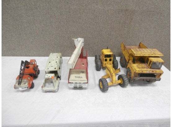 5 Tonka Toys Including A Dump Truck, Road Grader, Fire Truck, Car Carrier And Crane/truck