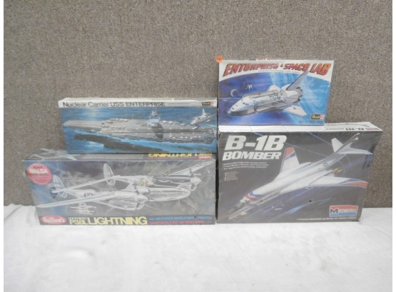 4 Sealed Scale Models Including Nuclear Carrier USS Enterprise Revell Guillows Lockheed P-38, Etc.