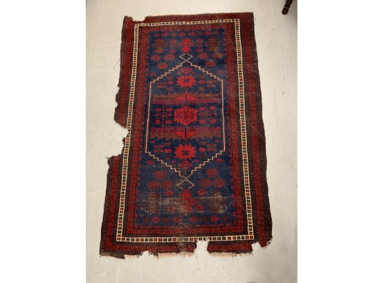 Very Worn Oriental Rug With Red And Blue Colors