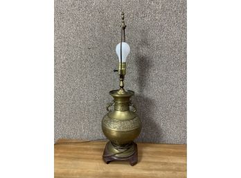 Oriental Brass Table Lamp With A Mahogany Base.