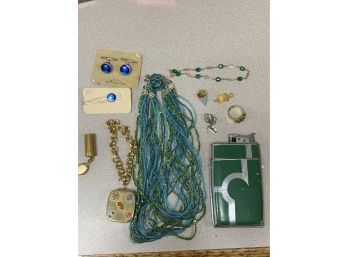 Costume Jewelry And Lighter