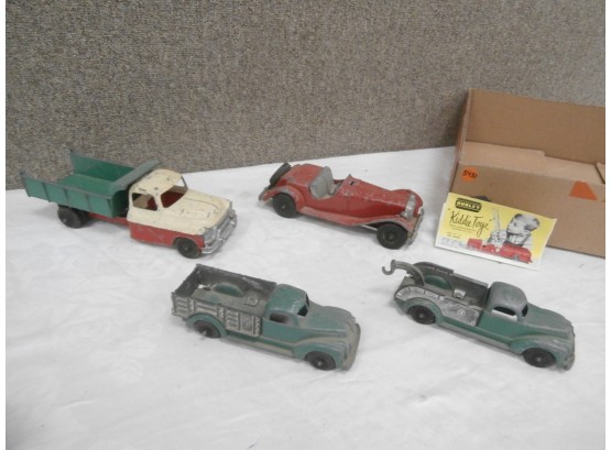 4 Hubley Toys Including 3 Kiddie Toy Trucks And A No. 485 Red MG Roadster Car