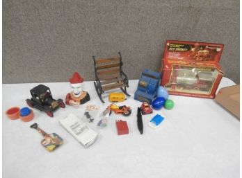 Toy Lot Including A Replica Cast Iron Mechanical Clown Bank, Battery Operated Old Smokey Train And More