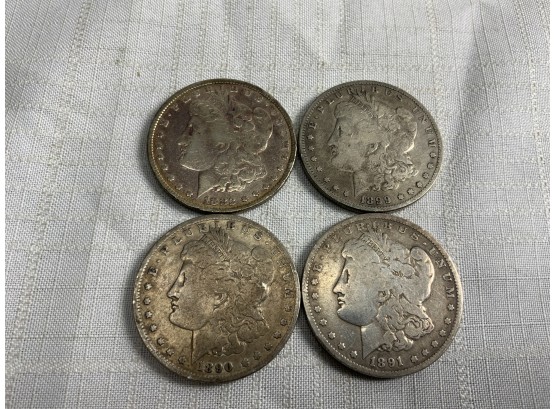 4 Morgan Dollars 1882, 1899, 1890, 1891