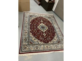 Red Oriental Hand Made Rug With A White And Blue Center Medallion