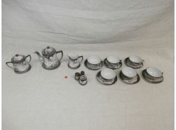 Partial Dragonware China With Teapot, Sugar, Creamer, Cups And Saucers, Condiment And Salt And Pepper Set
