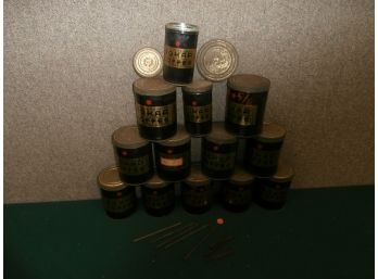 A Group Of Bokar Coffee Tins And Miscellaneous Wooden Ties In Some Of The Tins