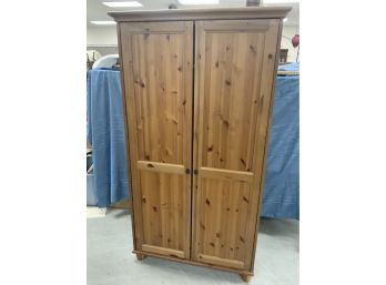 Tall Pine Wardrobe With A Shelf And Clothing Bar