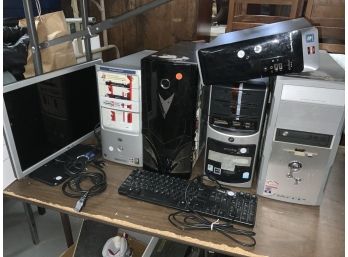 5 Computer Towers And 1 Monitors And 1 Keyboard As Is