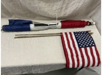 Open Flag With Pole And An American Flag
