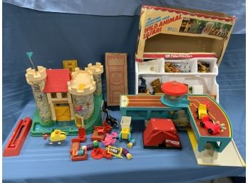 Vintage Collection Of Fisher Price Toy Play Sets Including Castle, Airport, And Wild Animal Safari