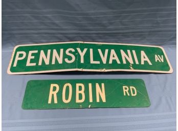 2 Street Signs Including Pennsylvania Avenue And Robin Road