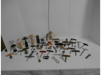 Bar Item Lot Including A Collection Of Cork Screws, Bottle Openers And Screw Pulls