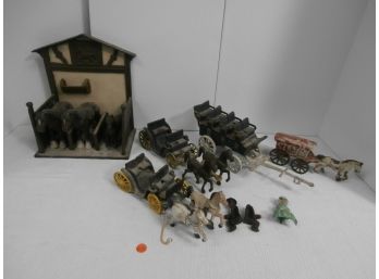 Cast Iron Toy Lot Including Stable With 3 Horses, 3 Carriages And A Couple