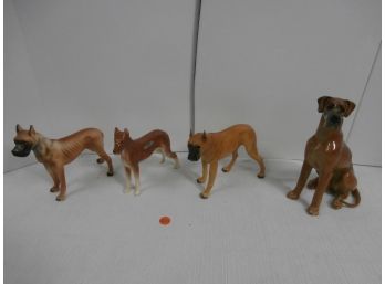 4 Ceramic Dog Figurines 3 Of Them Are Signed And 1 Is Stamped And Incised
