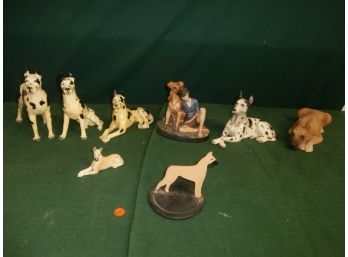 8 Dog Statues, All With Condition Issues