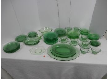 Assorted Green Depression Era Glassware Including Plates, Cups, Saucers And More