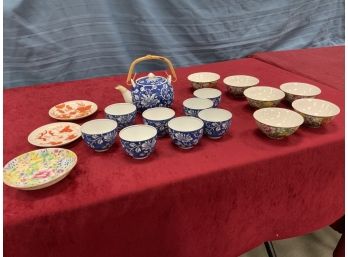 Oriental Lot Including A Teapot With A Wicker Handle, Tea Cups And Others