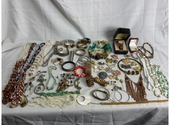 Large Costume Jewelry Including Bracelets, Necklaces, Pins And Some Signed Pieces