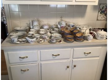 Large Assortment Of China, Porcelain, Tea Pots, Cups And Saucers, Bowls, Plates And Baskets