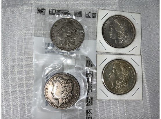 4 Morgan Dollars 1881-o, 87, 88-o, 1921-s