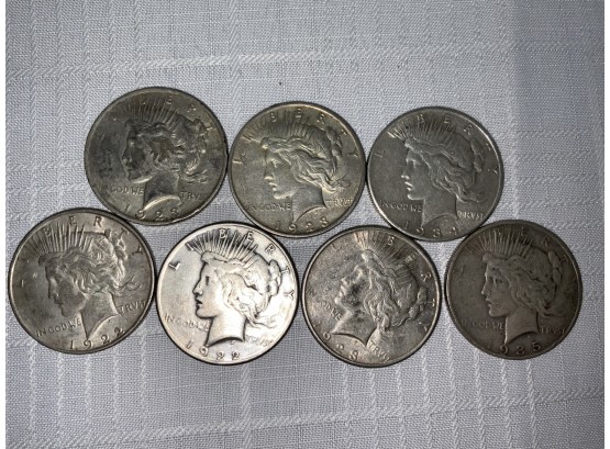7 Peace Silver Dollars 1922,23,34,35