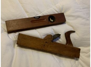 2 Antique Tools Including A Wood Plane And A Stanley 104 Level