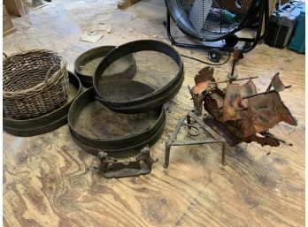 Country Lot Including Antique Sifters, Ship Lamp, Basket, Trivet And Cast Iron